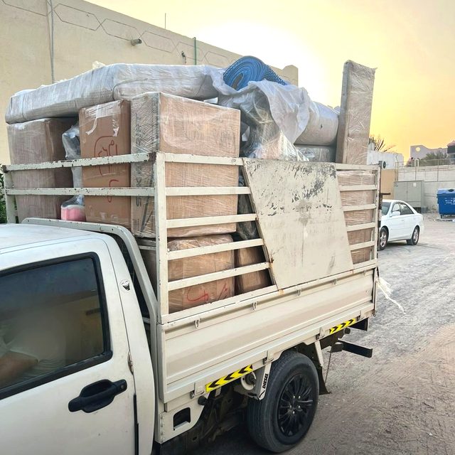 Pickup loaded with furniture
